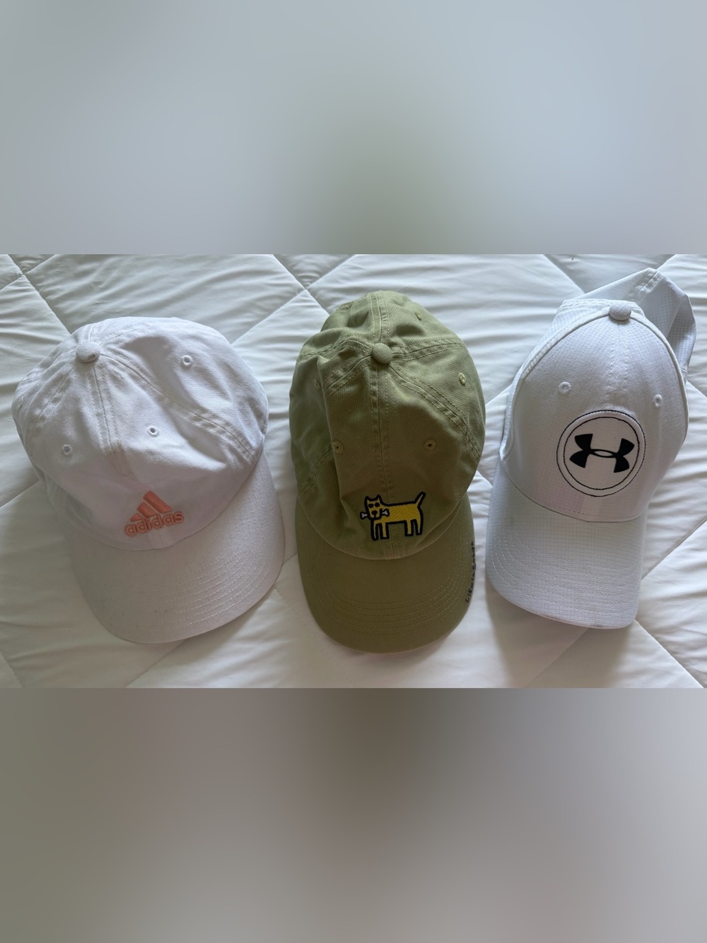 3 woman baseball hats - Adidas, Under Armor, and Life is Good.